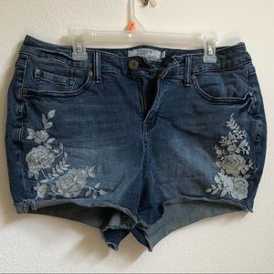 Torrid 16 embroidered cutoff shorts.